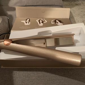 New in box- TYME hair curler, straightener.